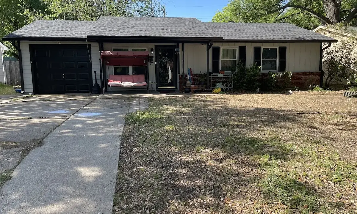Asphalt Shingle Roof Repair crew at work on a residential roof in Deerfield